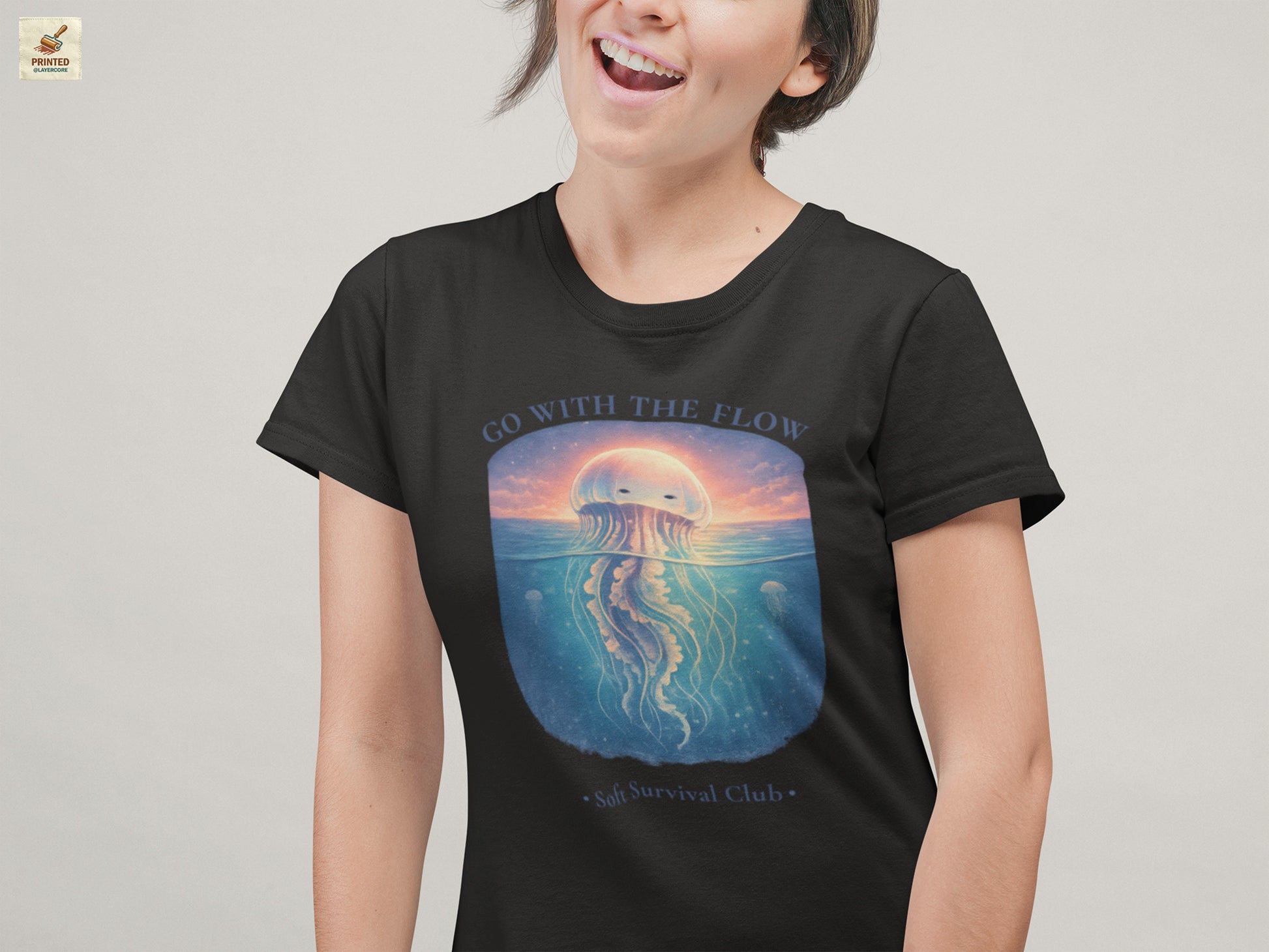 minimal jellyfish ocean aesthetic shirt with calm vintage design in black heather, worn by a young woman