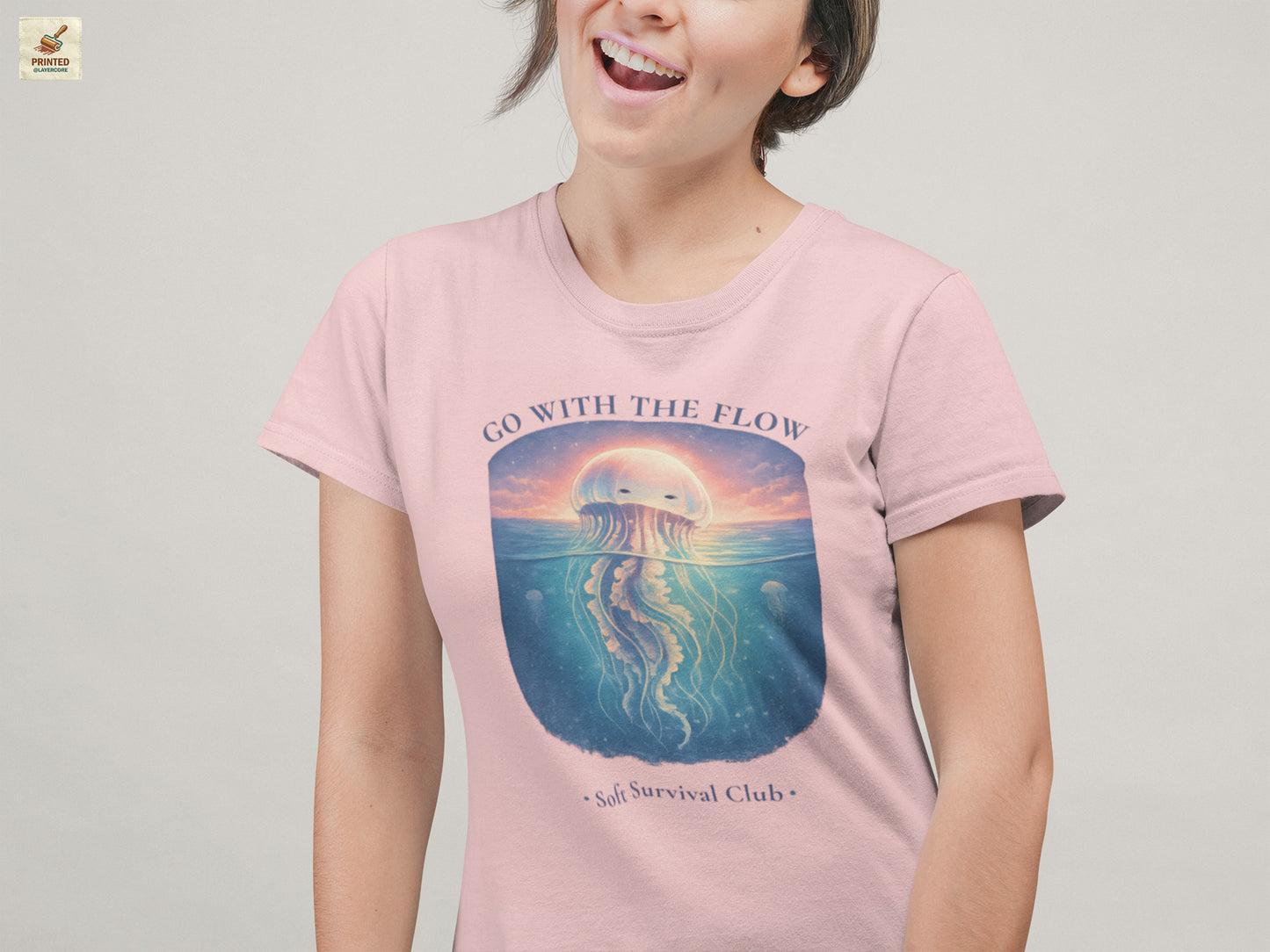 minimal jellyfish ocean aesthetic shirt with calm vintage design in pink, worn by a young woman