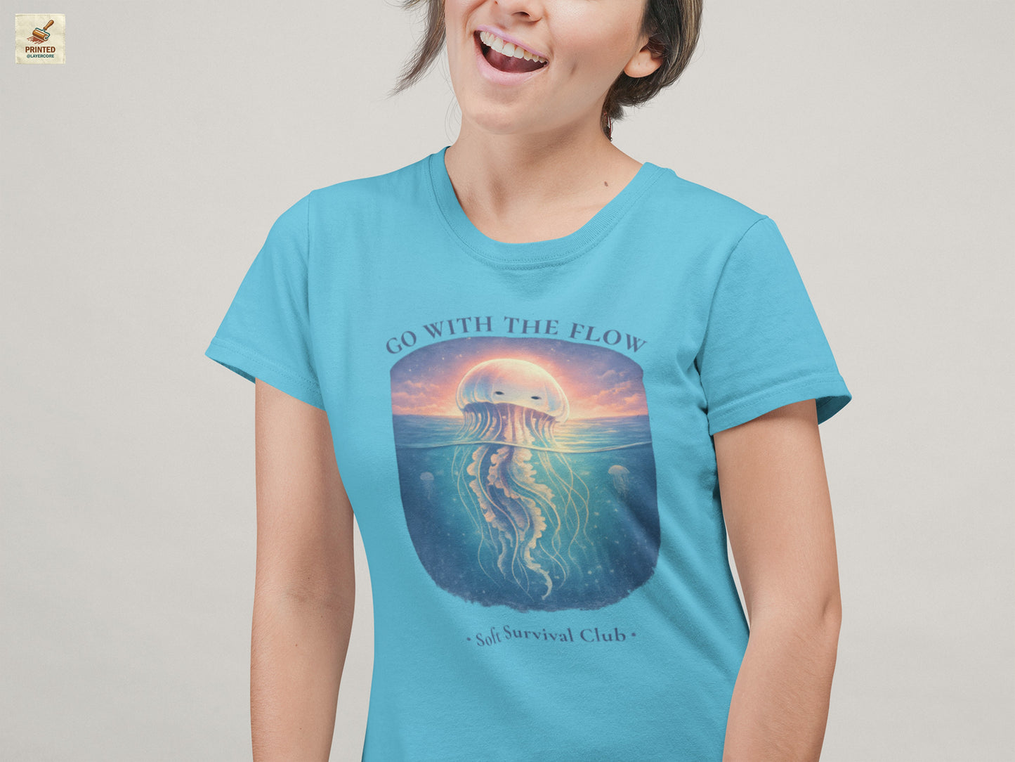 minimal jellyfish ocean aesthetic shirt with calm vintage design in light blue, worn by a young woman