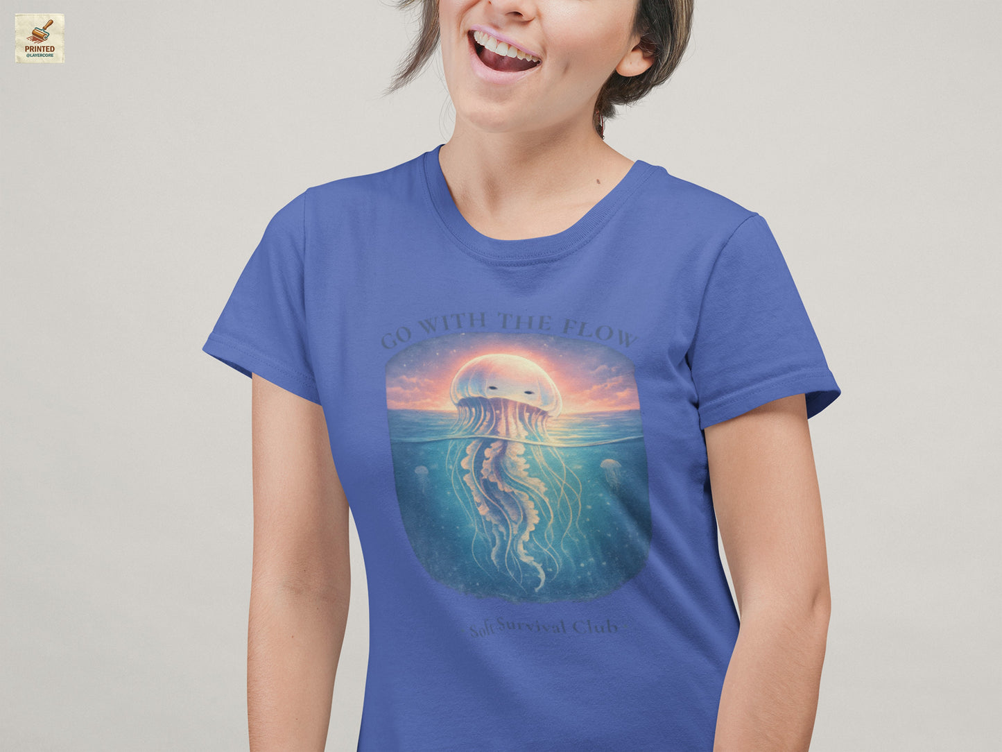 minimal jellyfish ocean aesthetic shirt with calm vintage design in blue, worn by a young woman