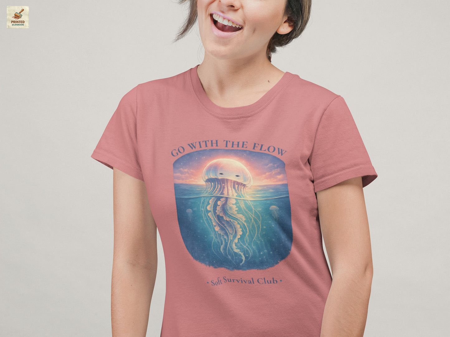 minimal jellyfish ocean aesthetic shirt with calm vintage design in mauve, worn by a young woman