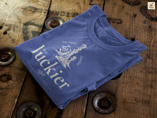 Navy blue shirt mockup showing vintage chess sketch and the phrase the more I practice the luckier I get