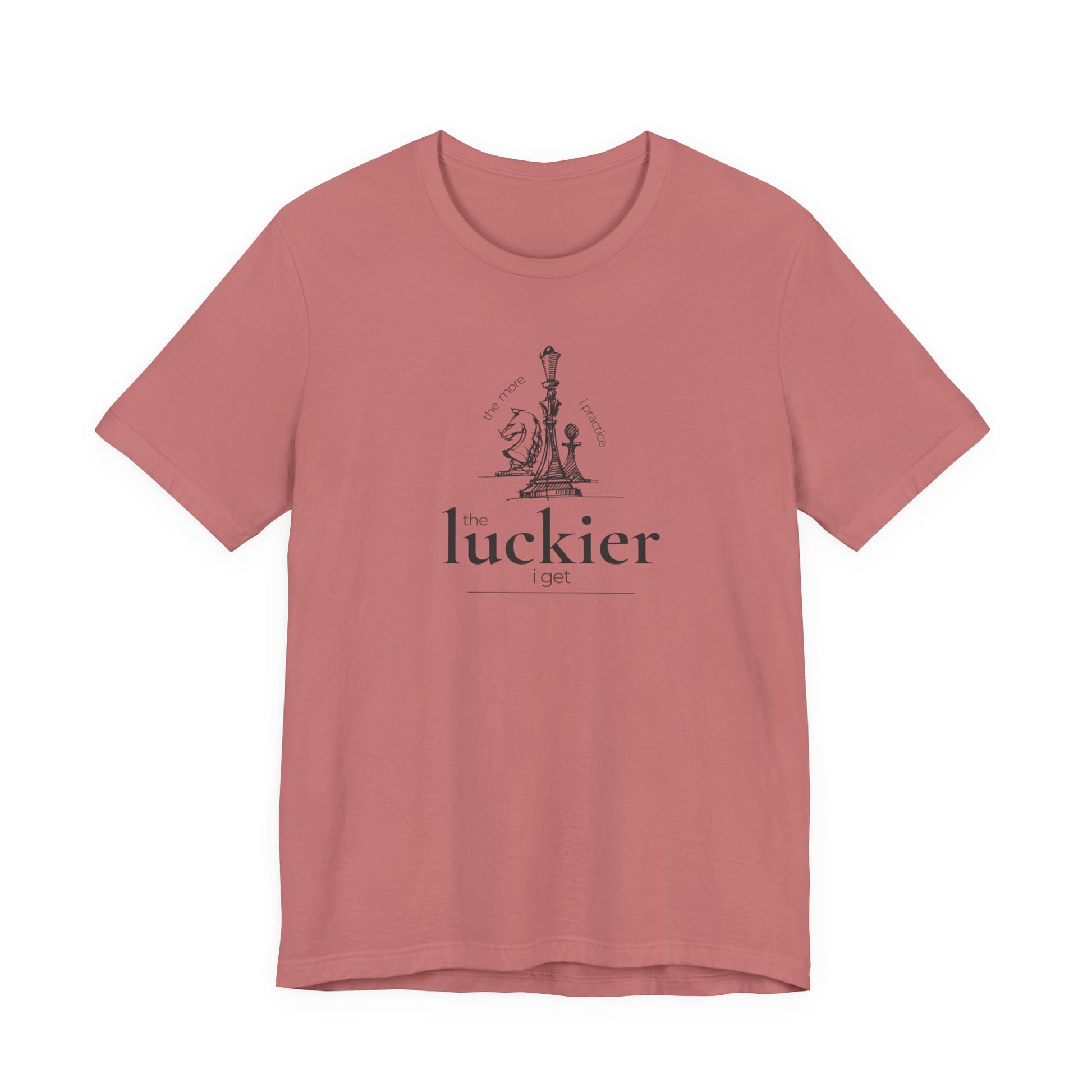 Mauve coloured shirt mockup showing vintage chess sketch and the phrase the more I practice the luckier I get
