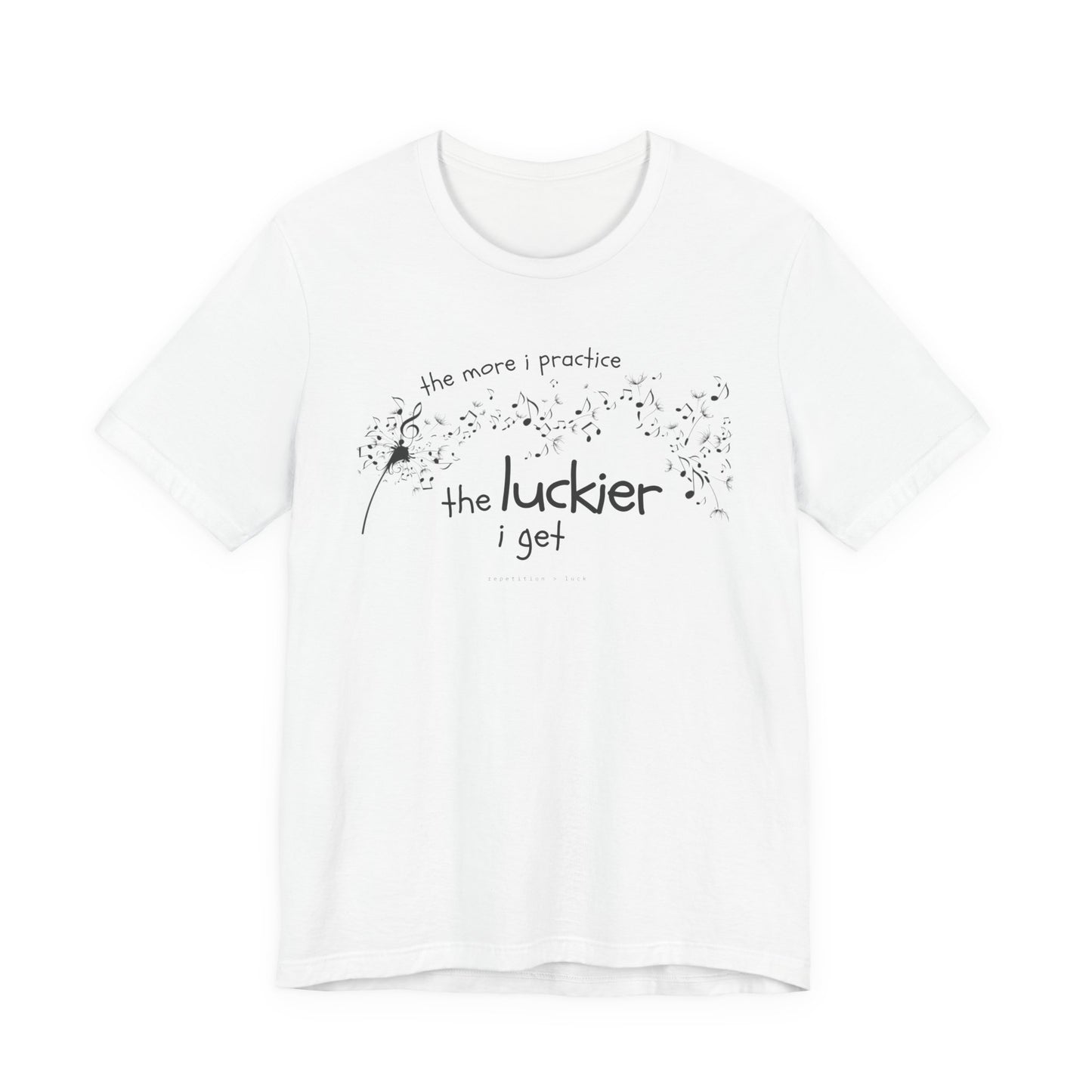 Front view of a white Bella Canvas t-shirt with a clever music-themed graphic. The design shows a stylized guitar headstock and musical notes above text that reads: ‘The more I practice, the luckier I get.’ Soft 100% cotton shirt perfect for musicians and music teachers.