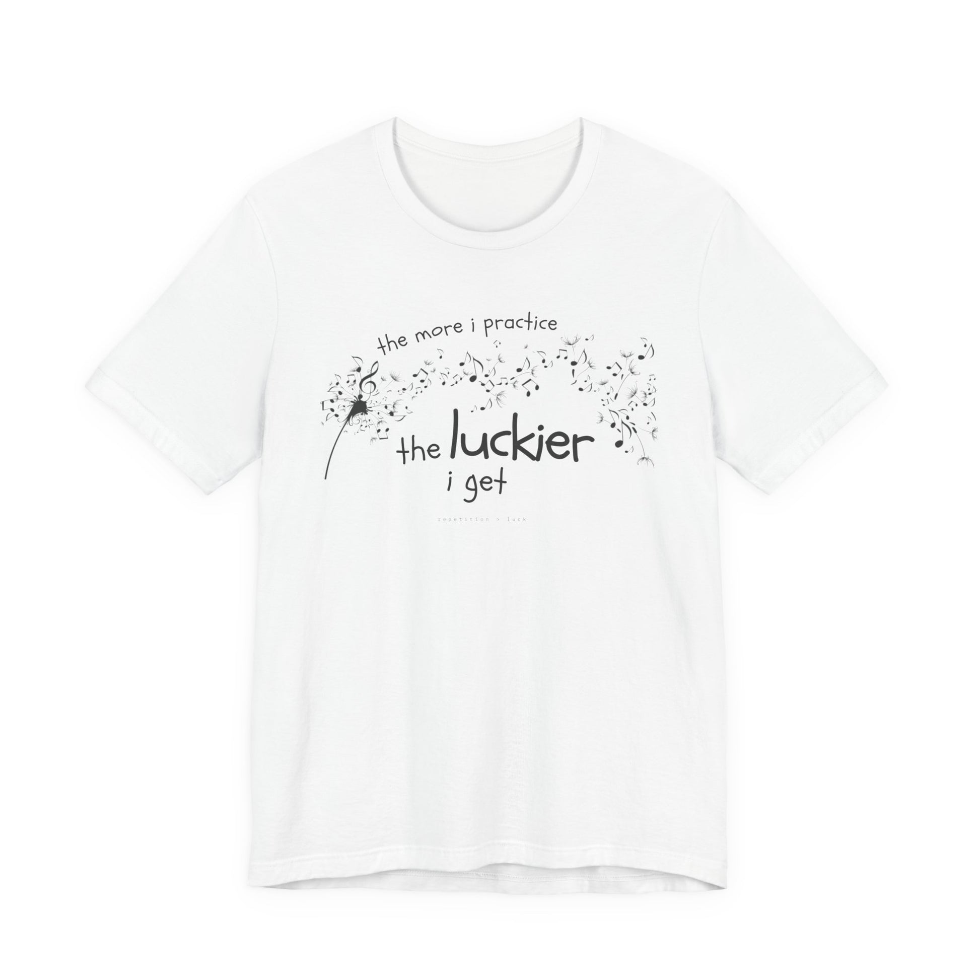 Front view of a white Bella Canvas t-shirt with a clever music-themed graphic. The design shows a stylized guitar headstock and musical notes above text that reads: ‘The more I practice, the luckier I get.’ Soft 100% cotton shirt perfect for musicians and music teachers.
